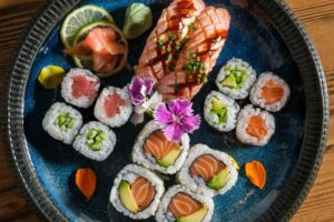 assorted-sushi-rolls-ceramic-plate-scaled