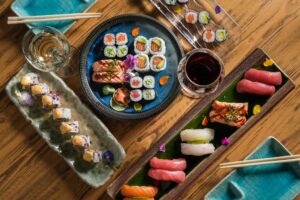 assorted-sushi-rolls-table-scaled